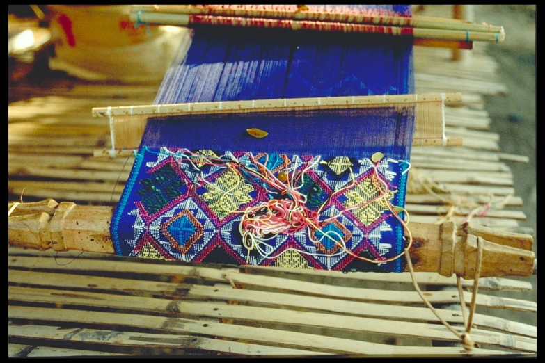 an image of a colorful embroidery being worked