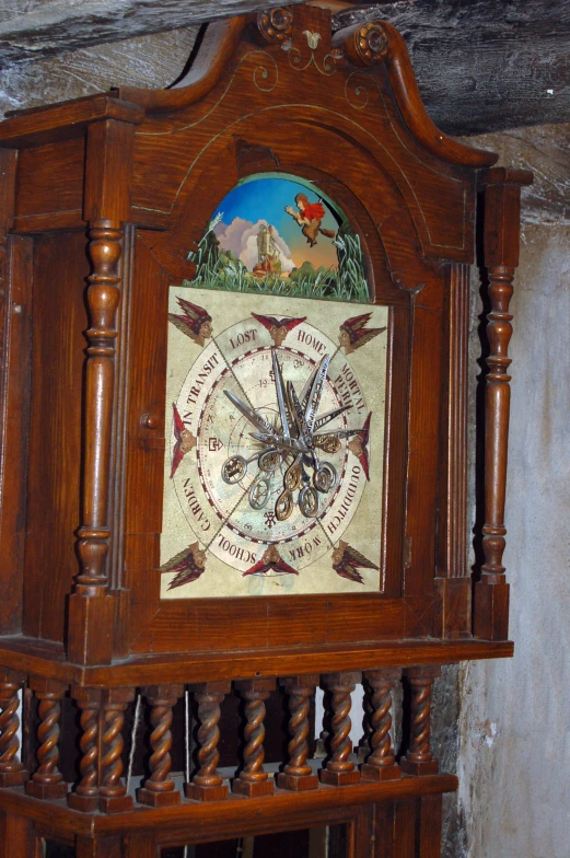 a grandfather clock with a painting on the wall