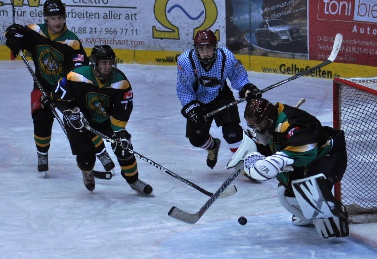 the two hockey players have caught the puck