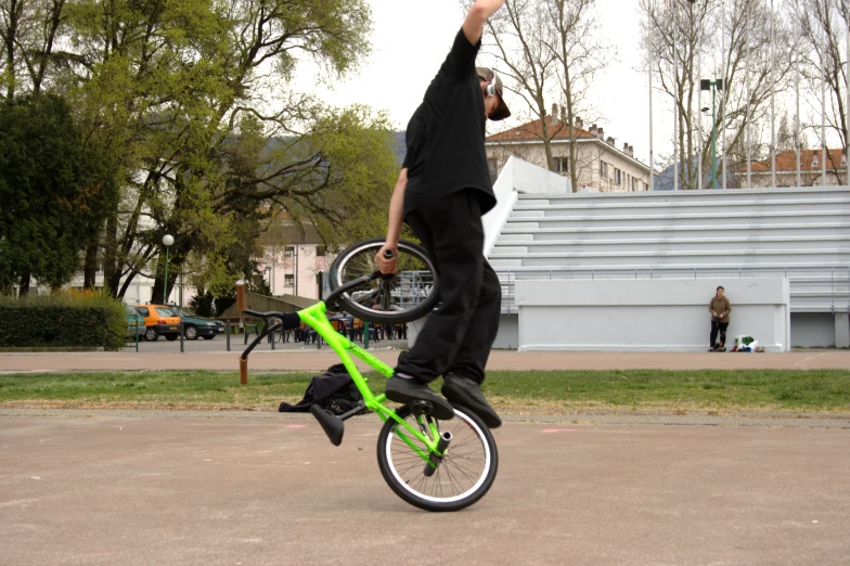 the young man is doing a trick with his skateboard