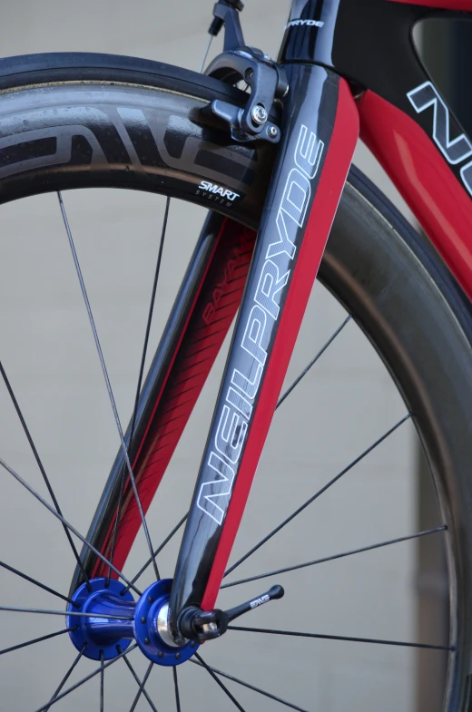 a bike is shown with spokes and a blue wheel