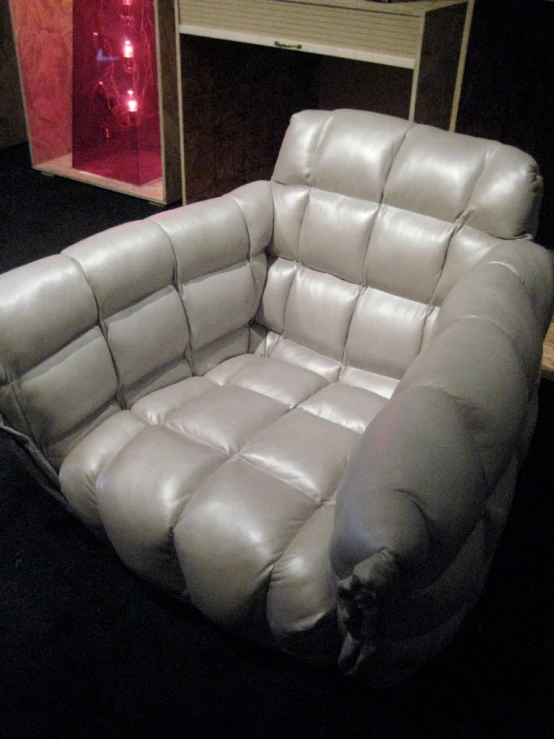 there is an image of a modern leather recliner chair
