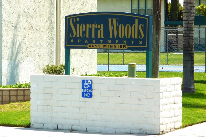 a sign for sierra woods apartments is shown