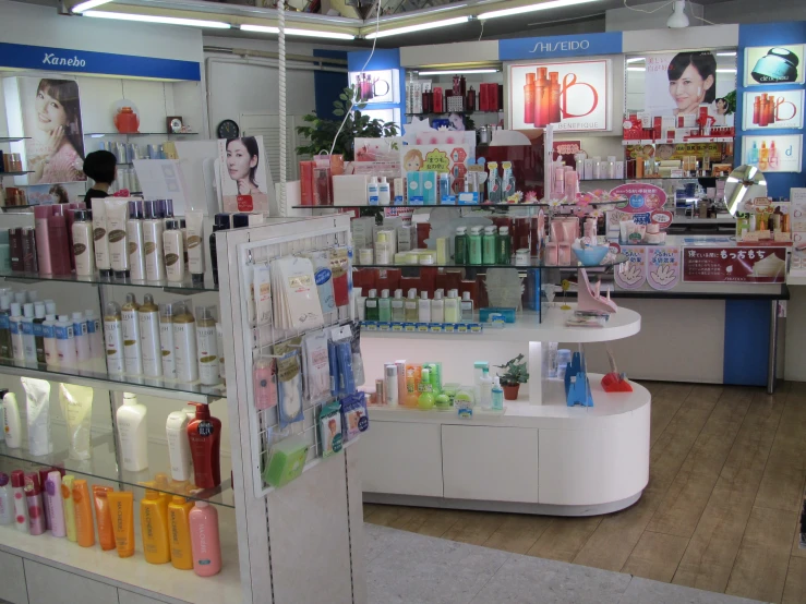 the shelves and counter in a store with perfumes