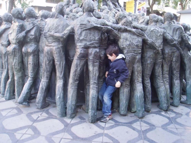a  standing in the middle of a statue