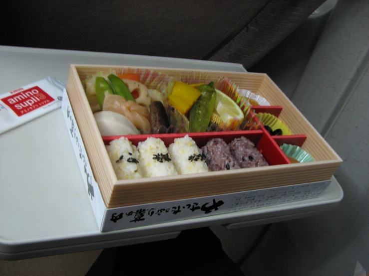 an open box containing different types of foods