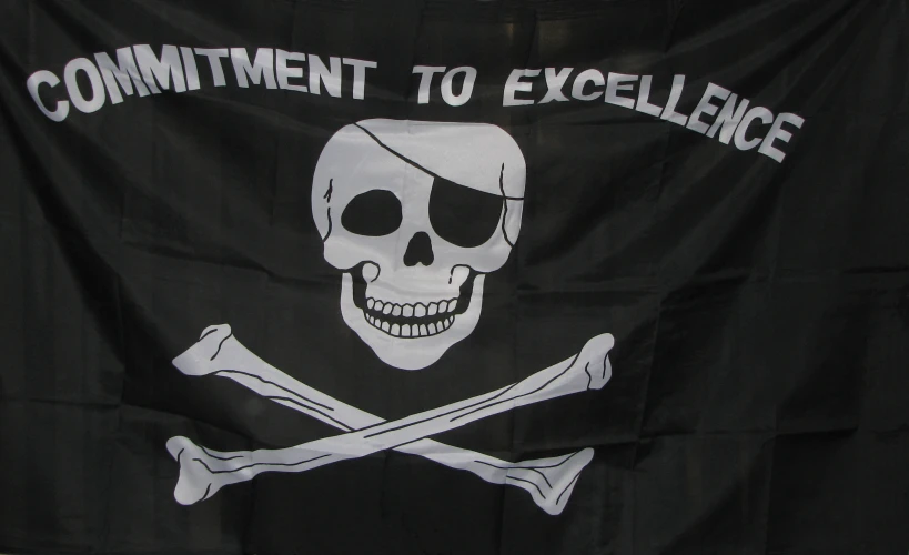 a banner with a skull and cross bones on it