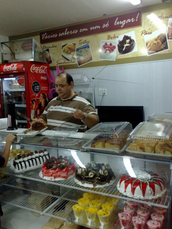 a couple of people are looking at some food