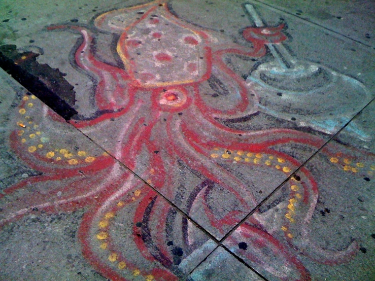 an octo is on the ground in chalk