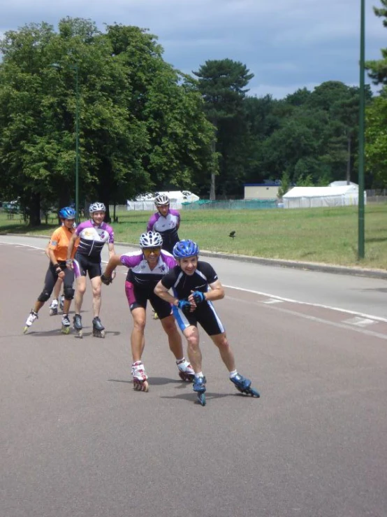 people playing in an open area with two rollerblades