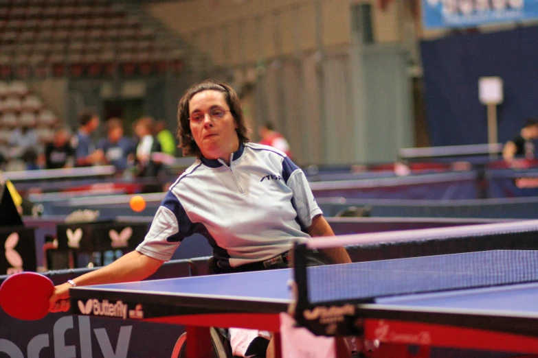 a female tennis player getting ready to play