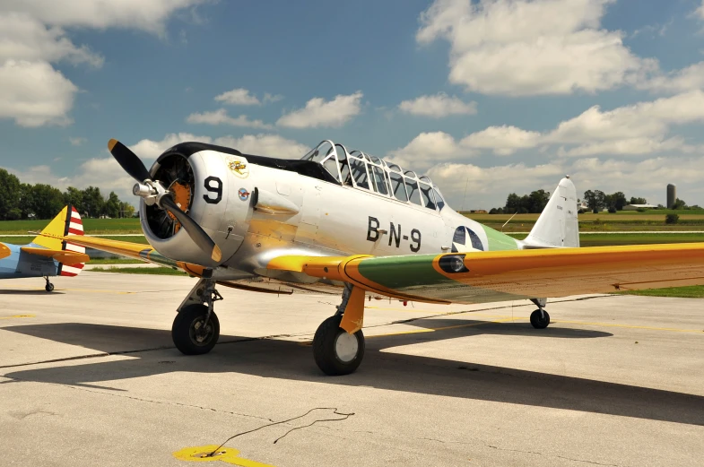 a small airplane sitting on a runway