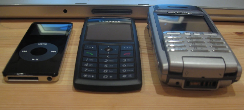 four different cell phones are shown side by side