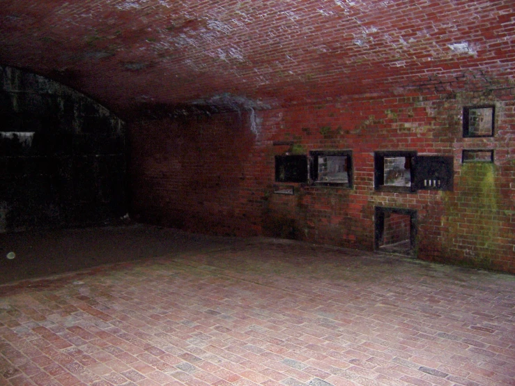 a room with brick walls and brick floors