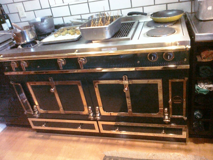 a kitchen stove that is next to a counter top