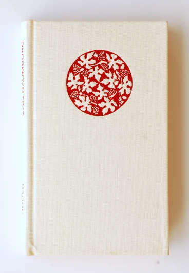 a book with a red circle pattern on it