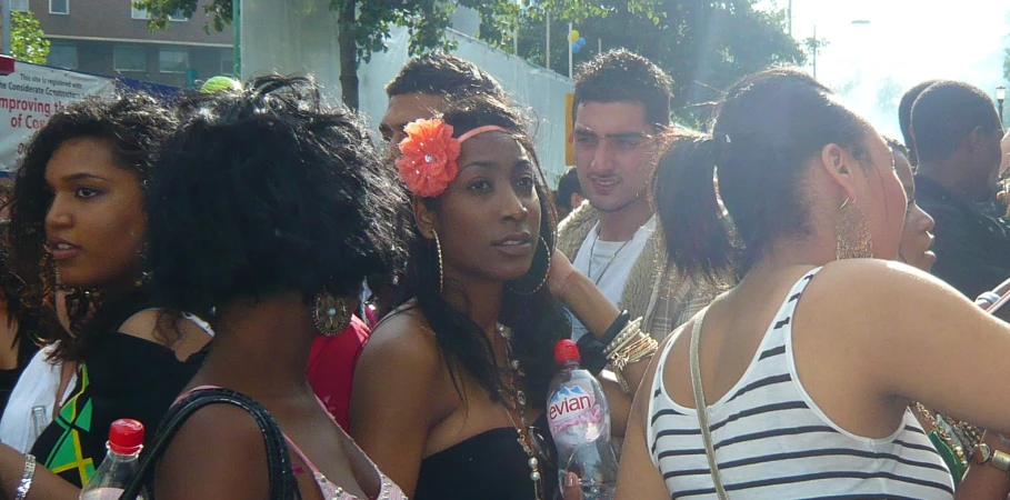 several young women are gathered near one another