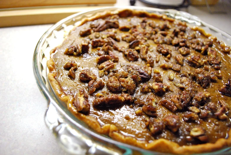 a pie is sitting on a table, ready to be eaten