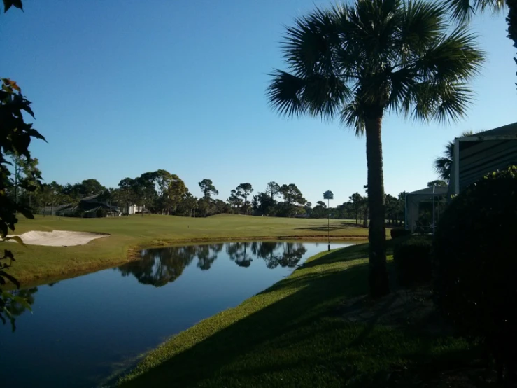 the beautiful blue water next to the course houses