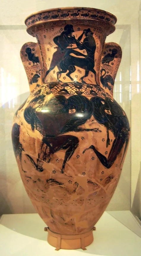 an old antique vase sitting on display