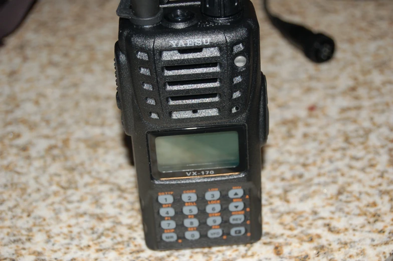 there is a old radio sitting on the table