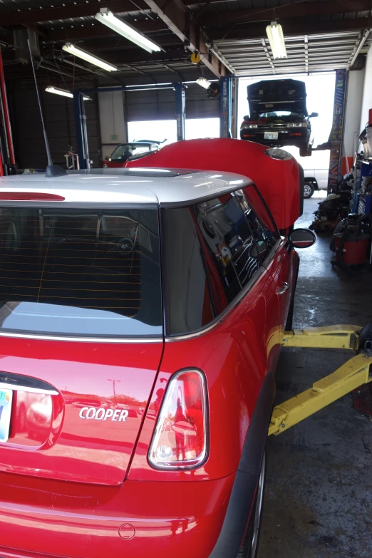 a car is being towed through a parking garage