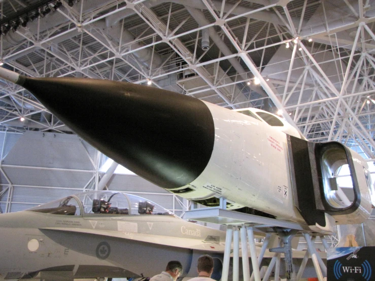 the space shuttle is mounted on a metal rack