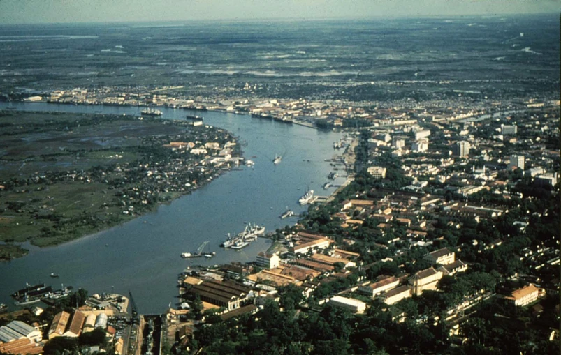 an aerial view of a city and river from above