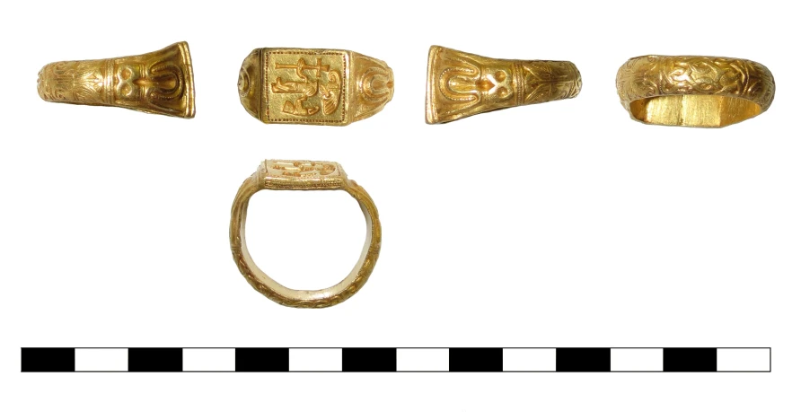 a picture of three ancient gold objects