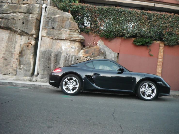 a sports car parked on the side of the road