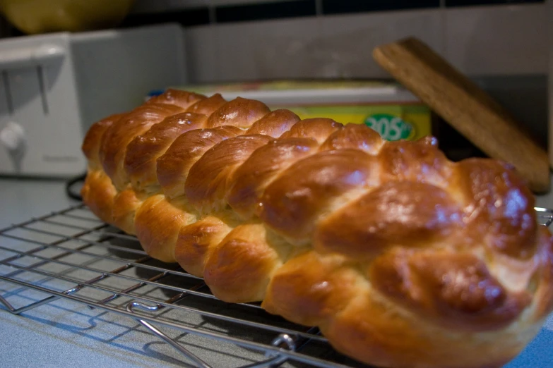 some bread is placed on the cooling rack