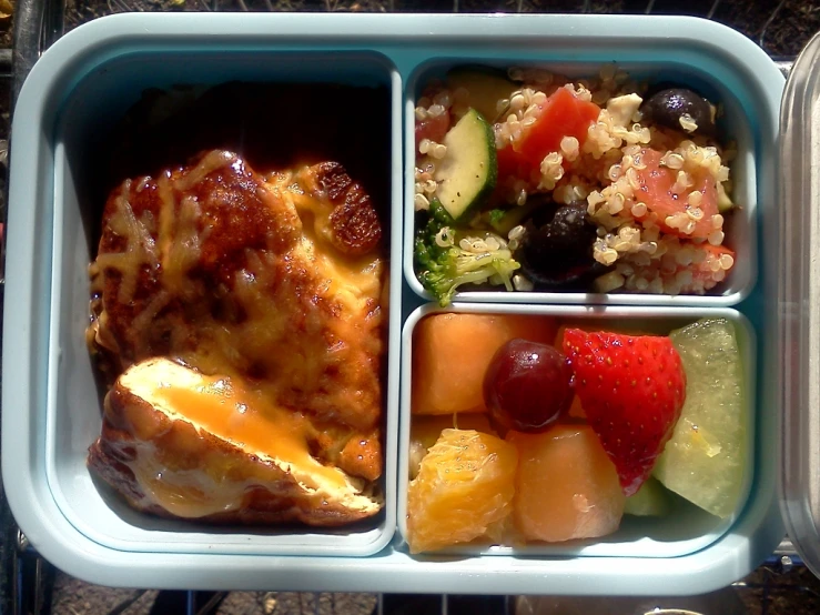 there are three compartments in a tray with food