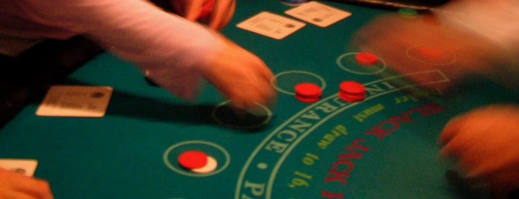 a casino table with people playing a game of roule