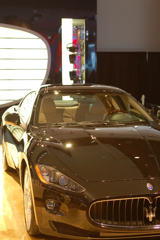 a masera sits in a show room, ready for customers