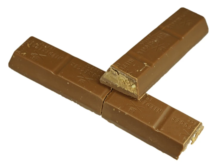two pieces of chocolate are stacked on each other
