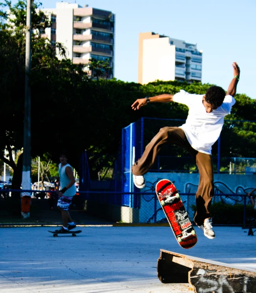 a young man doing a trick on a skateboard