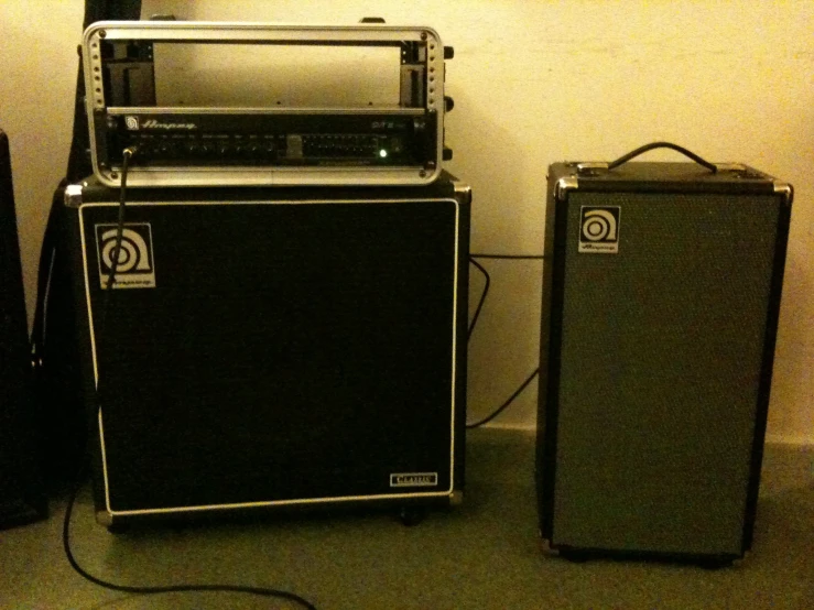 some speakers, amps and amplifier equipment set up