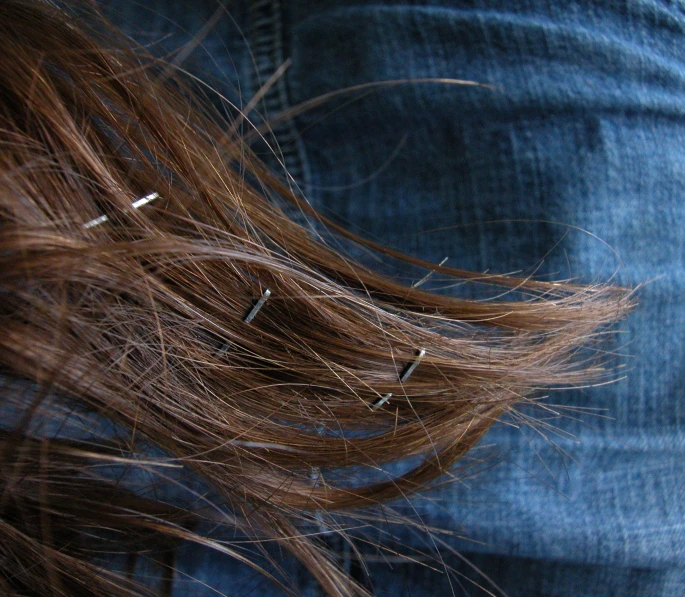 a woman with a hair slide on her back