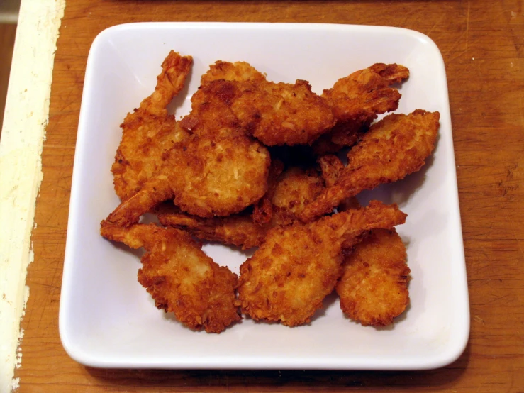 an easy to make, fried, snack or appetizer sits on a white plate