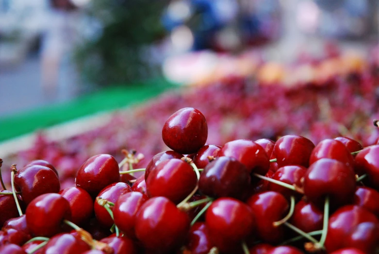 a bunch of cherries that are next to each other