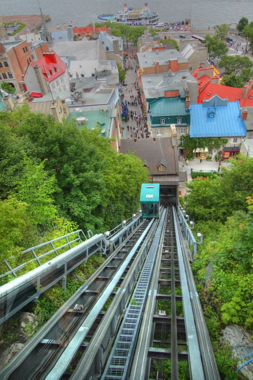 view of the top of a train and a green bus