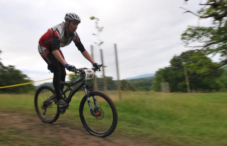 the cyclist has just taken off the course in his race