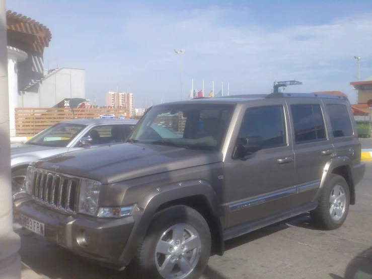 an suv is parked in a parking lot