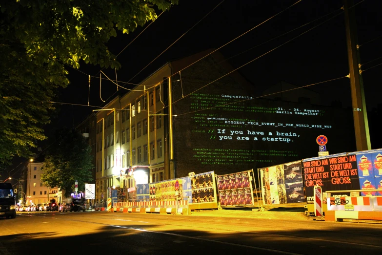 a street corner has been decorated with advertising signs