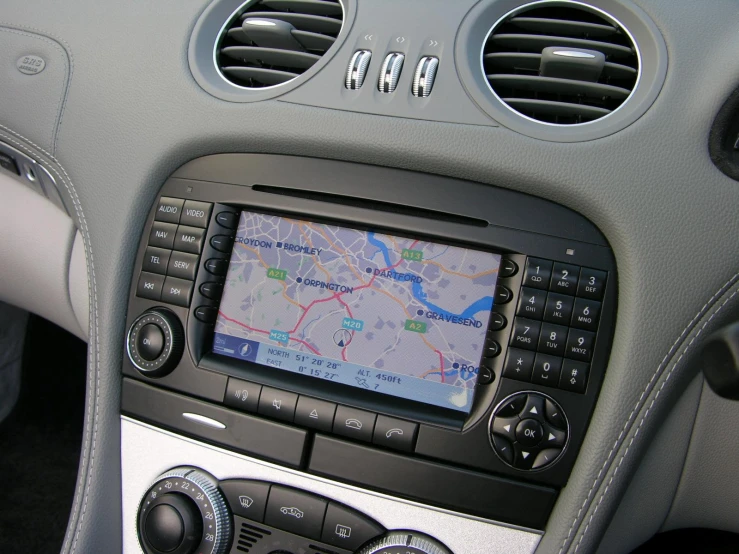 a dashboard mounted electronic device inside of a car
