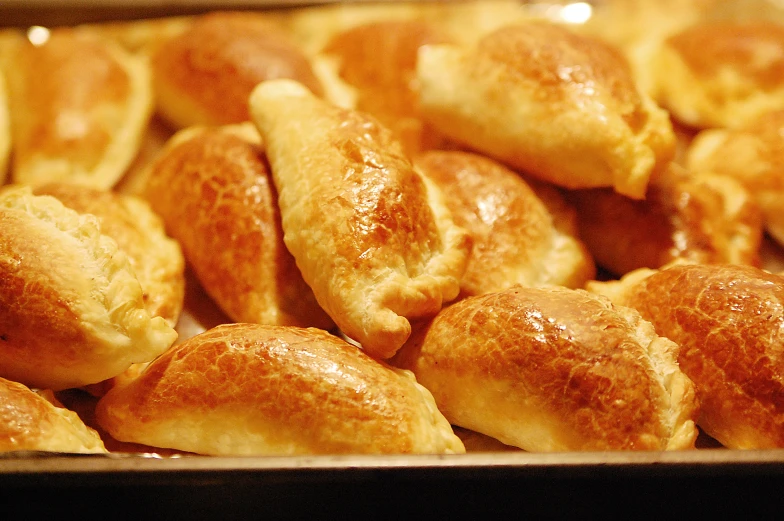 several pieces of bread are on a tray