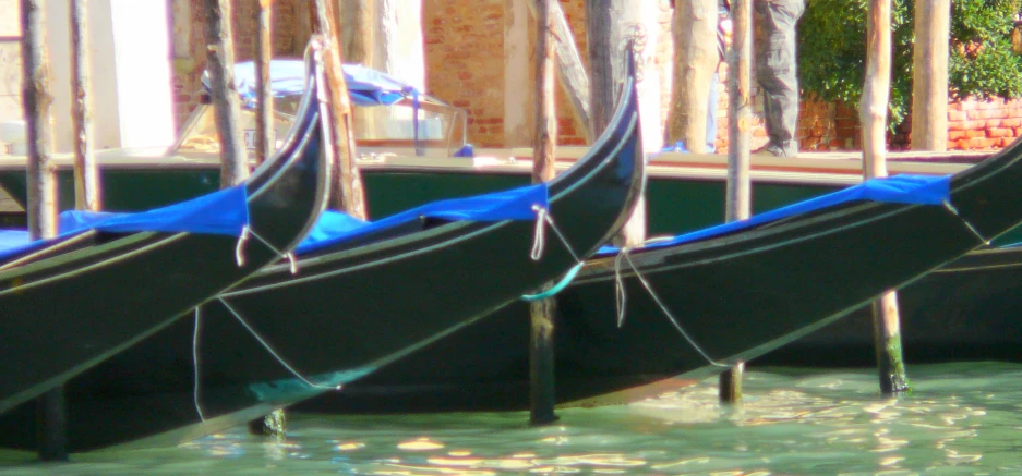 a couple of boats floating next to each other