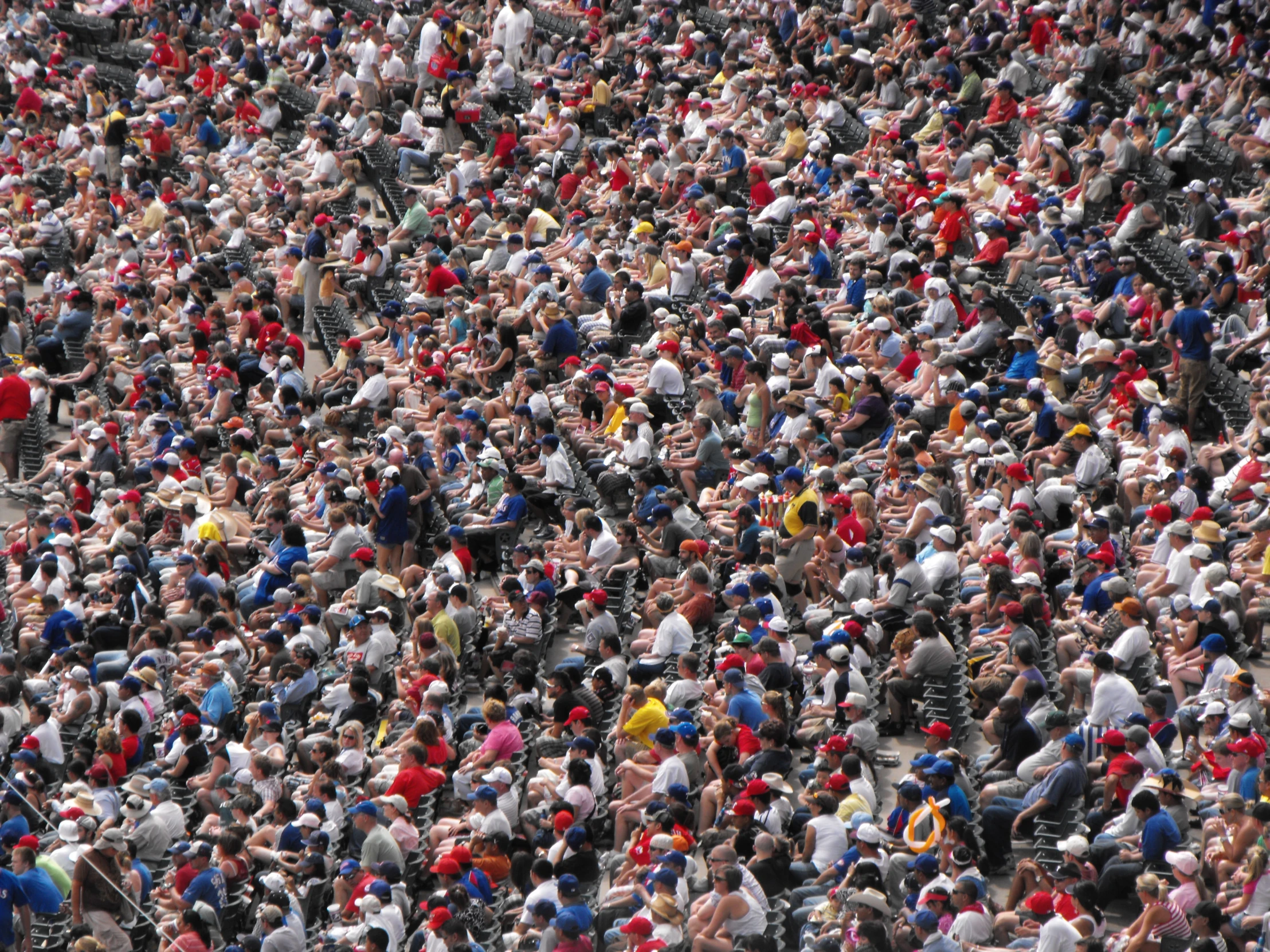 a crowd of people are gathered in a stadium