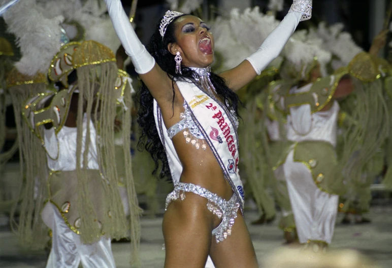 woman with face paint in a costume at an elaborate performance