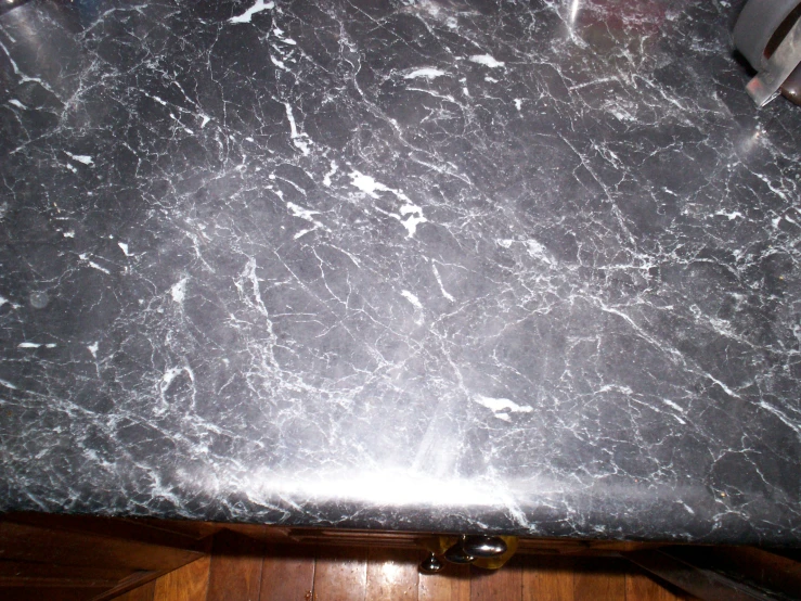 the top of a counter is black and white